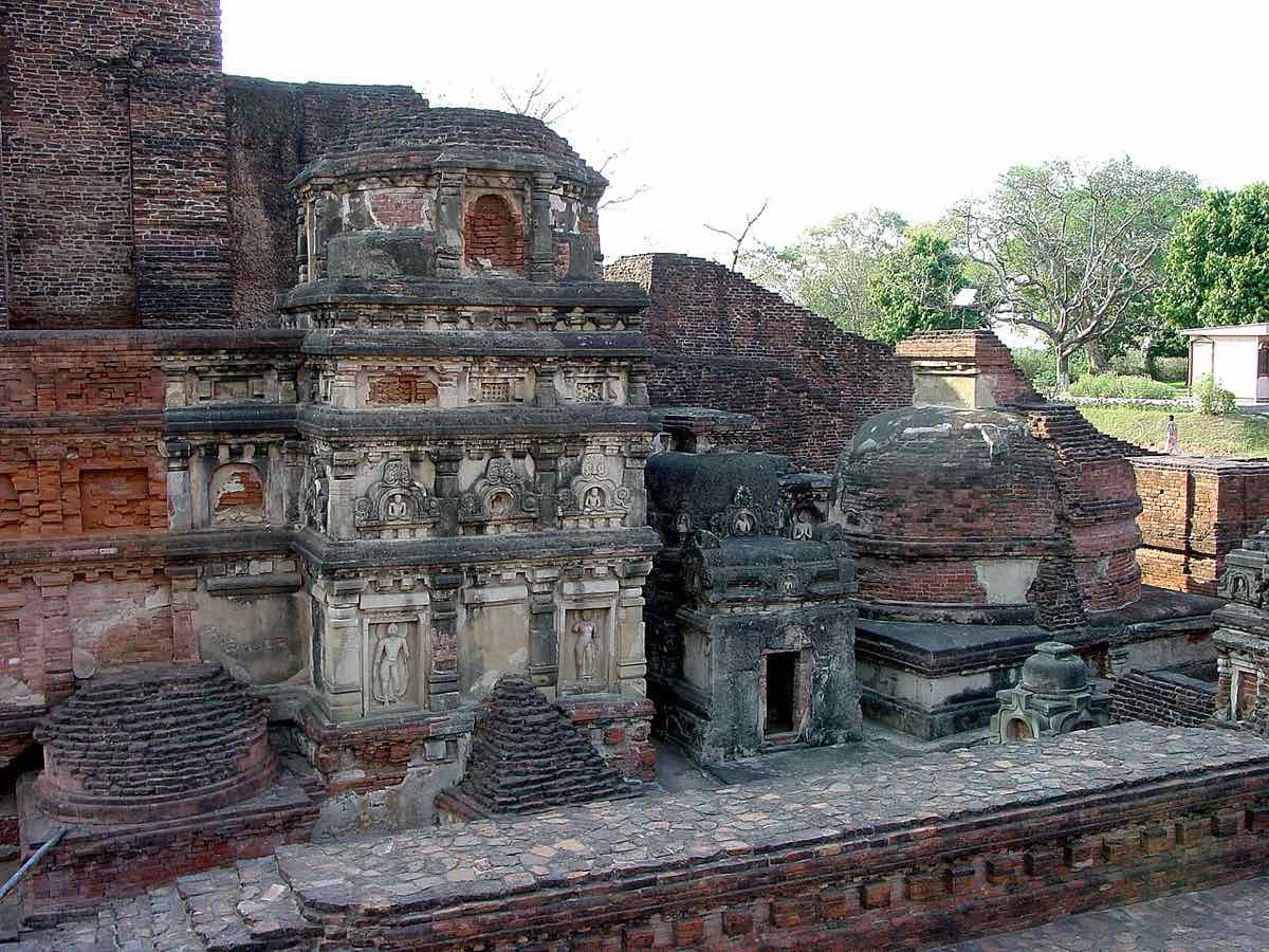 A smaller shrine beside Temple 3 at Nalanda, among the votive stupas