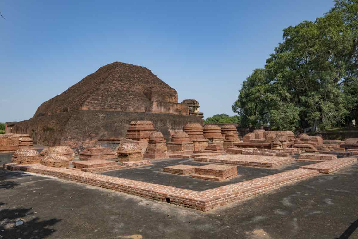 Temple 3 at Nalanda from the south-west, its stepped brick mass rising over the stupa field